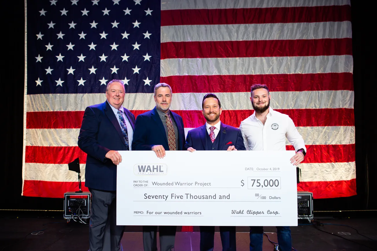 Wahl presents donation to support wounded veterans